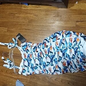 Women's medium Bebe fitting sleeveless dress. New with tag